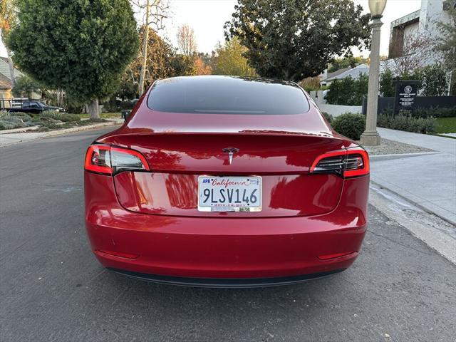 used 2022 Tesla Model 3 car, priced at $16,995