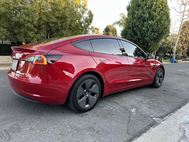 used 2022 Tesla Model 3 car, priced at $16,995