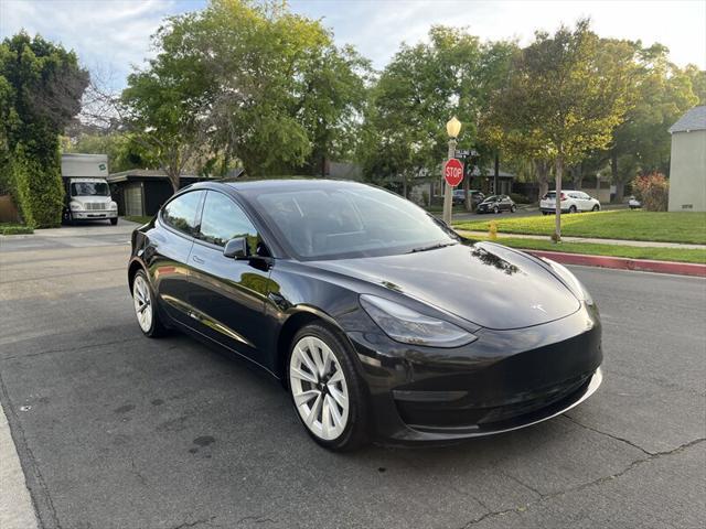 used 2022 Tesla Model 3 car, priced at $14,995