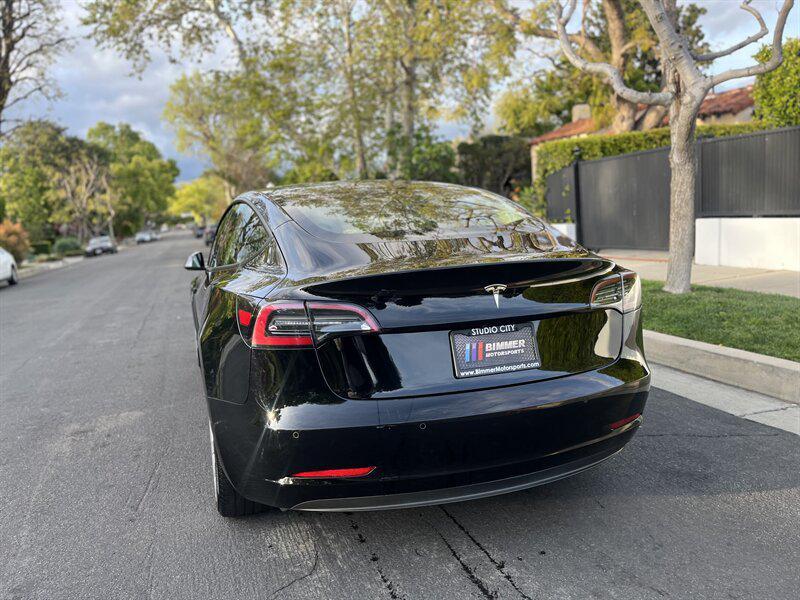 used 2022 Tesla Model 3 car, priced at $17,995