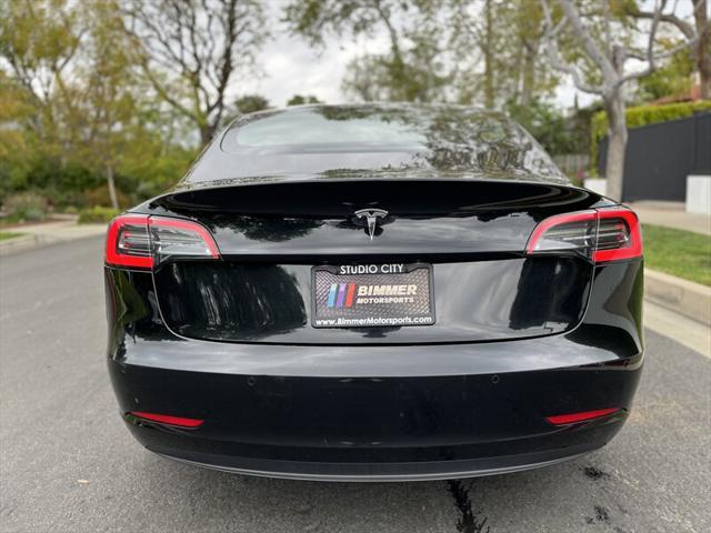 used 2022 Tesla Model 3 car, priced at $14,995