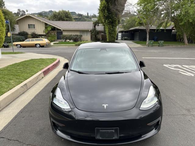 used 2022 Tesla Model 3 car, priced at $14,995