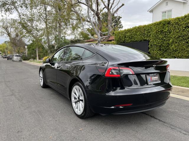 used 2022 Tesla Model 3 car, priced at $14,995