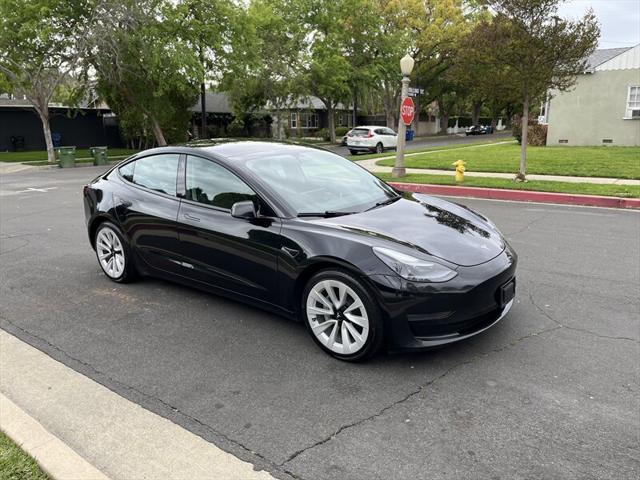used 2022 Tesla Model 3 car, priced at $14,995
