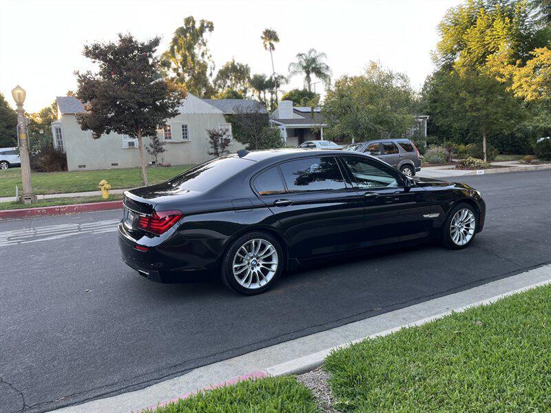 used 2015 BMW 750 car, priced at $9,995