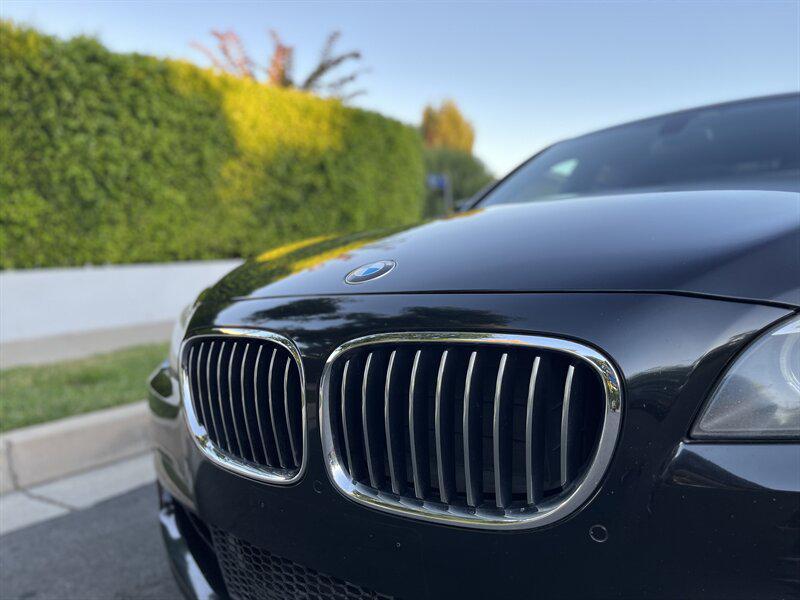 used 2015 BMW 750 car, priced at $9,995