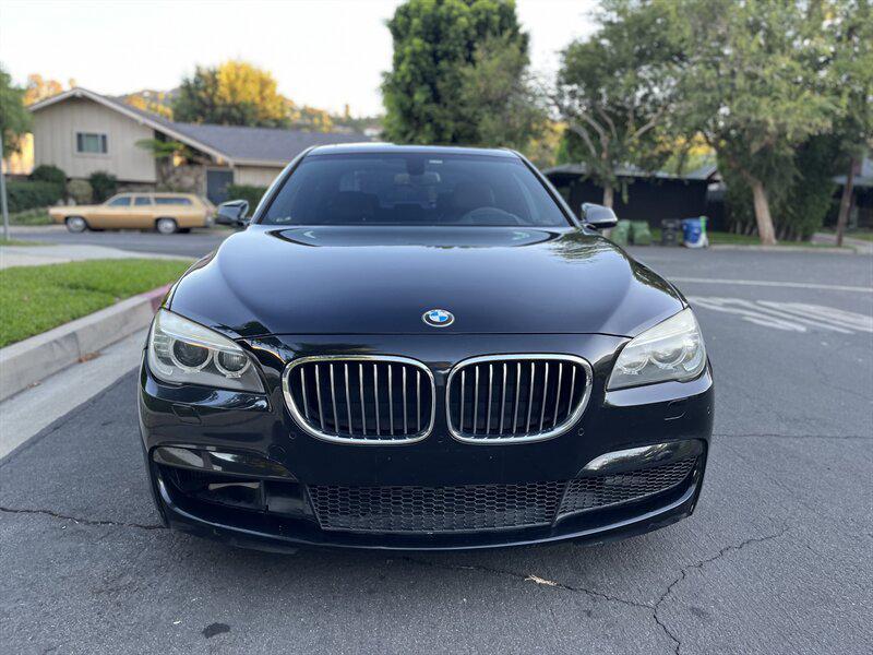 used 2015 BMW 750 car, priced at $9,995