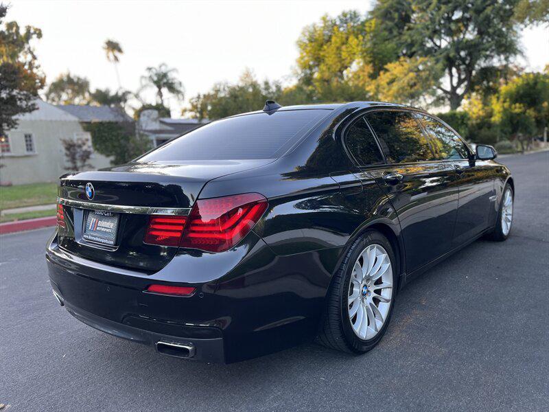 used 2015 BMW 750 car, priced at $9,995