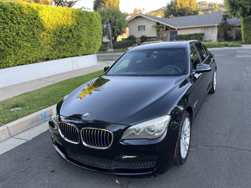 used 2015 BMW 750 car, priced at $9,995