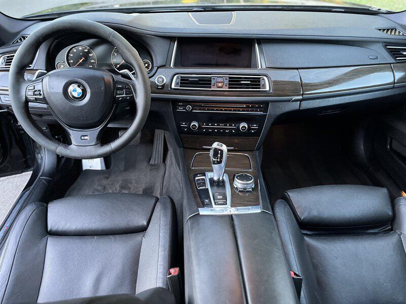 used 2015 BMW 750 car, priced at $9,995