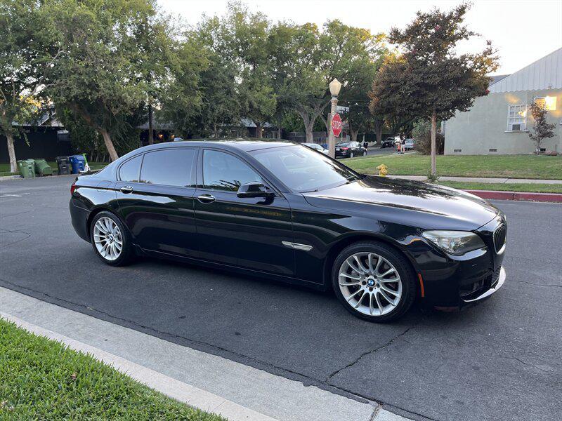 used 2015 BMW 750 car, priced at $9,995