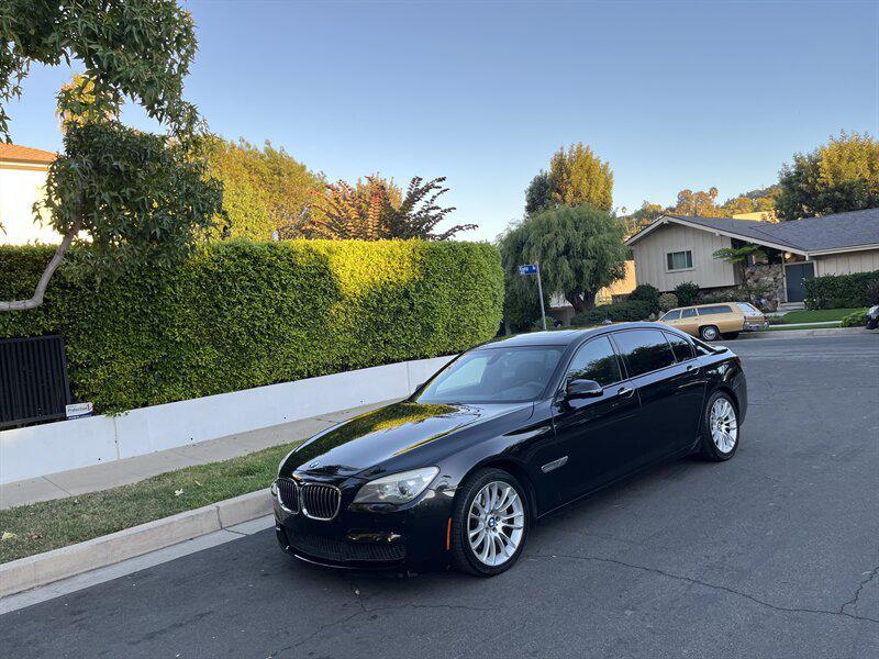 used 2015 BMW 750 car, priced at $9,995