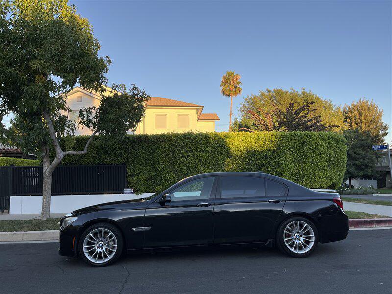used 2015 BMW 750 car, priced at $9,995