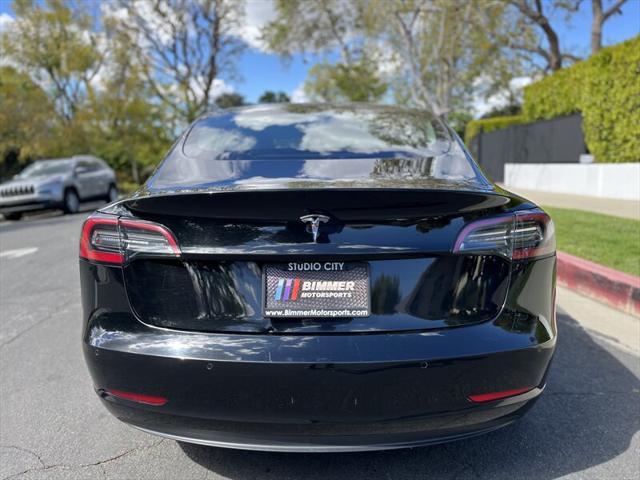 used 2022 Tesla Model 3 car, priced at $14,995