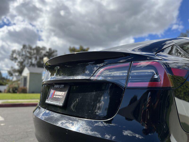 used 2022 Tesla Model 3 car, priced at $17,995