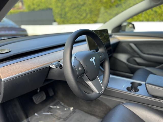 used 2022 Tesla Model 3 car, priced at $14,995
