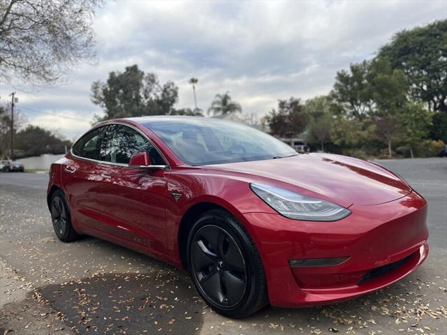 used 2018 Tesla Model 3 car, priced at $10,995