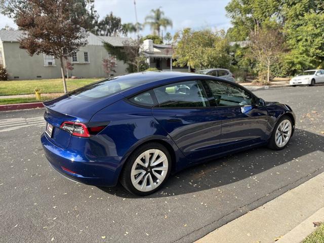 used 2022 Tesla Model 3 car, priced at $15,995