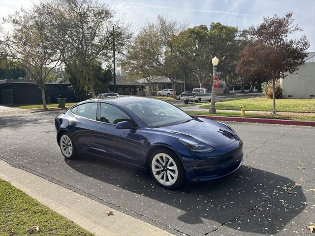 used 2022 Tesla Model 3 car, priced at $15,995