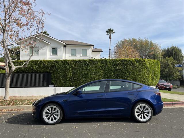 used 2022 Tesla Model 3 car, priced at $15,995