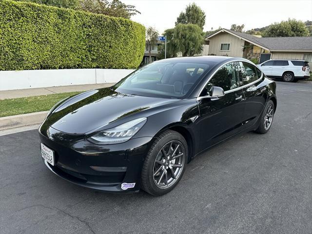 used 2018 Tesla Model 3 car, priced at $13,995