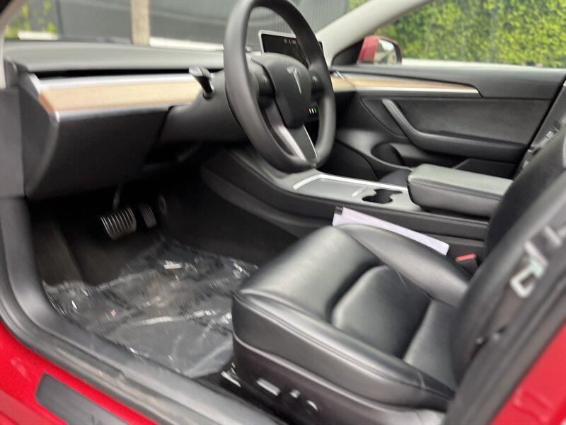 used 2022 Tesla Model 3 car, priced at $13,995