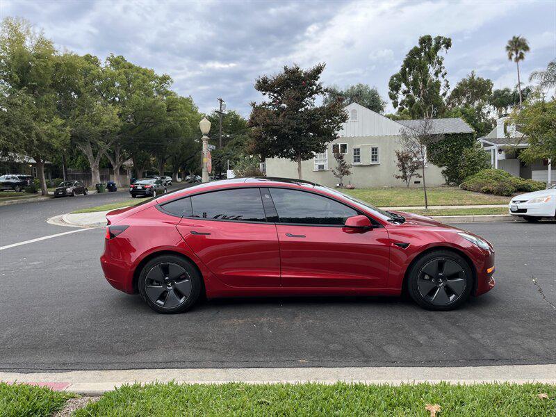 used 2022 Tesla Model 3 car, priced at $13,995