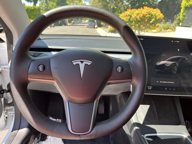 used 2023 Tesla Model 3 car, priced at $24,995