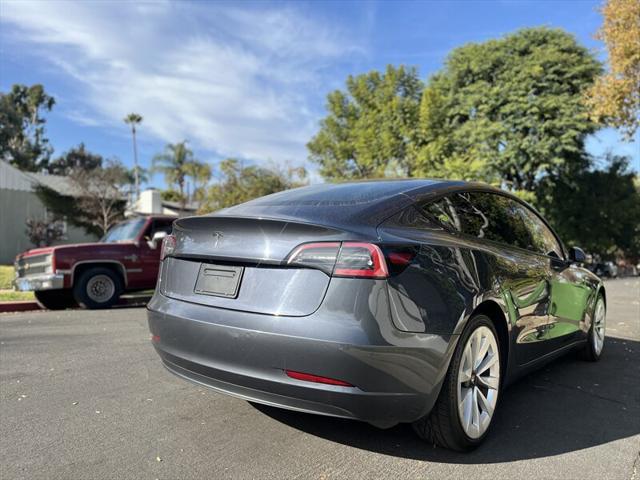 used 2022 Tesla Model 3 car, priced at $15,995