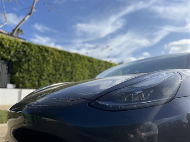 used 2022 Tesla Model 3 car, priced at $15,995