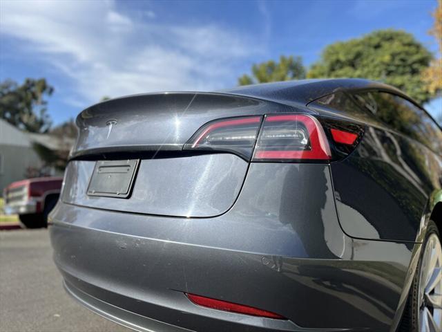 used 2022 Tesla Model 3 car, priced at $15,995