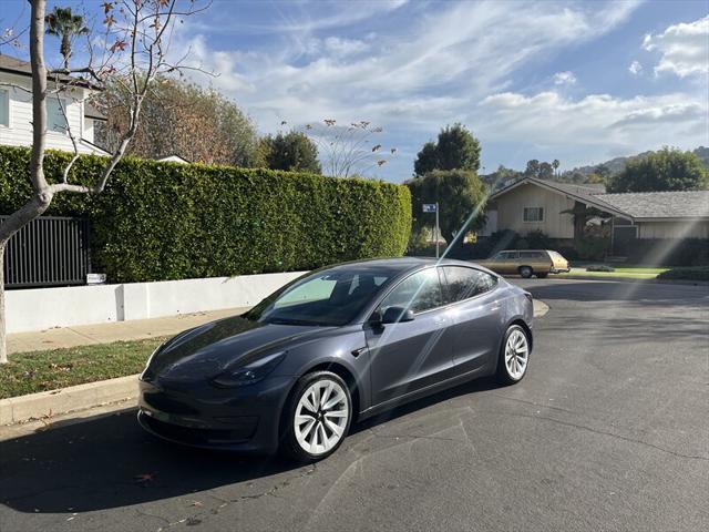 used 2022 Tesla Model 3 car, priced at $15,995