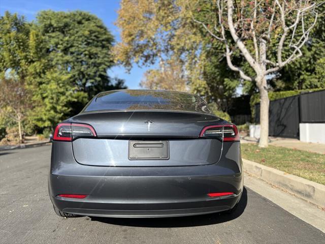 used 2022 Tesla Model 3 car, priced at $15,995