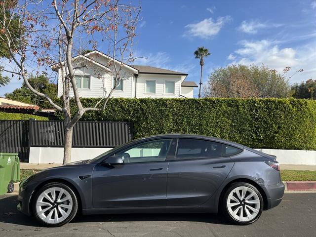 used 2022 Tesla Model 3 car, priced at $15,995