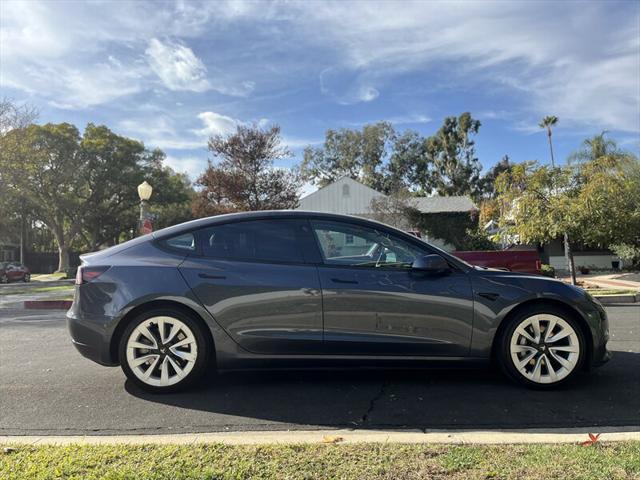 used 2022 Tesla Model 3 car, priced at $15,995