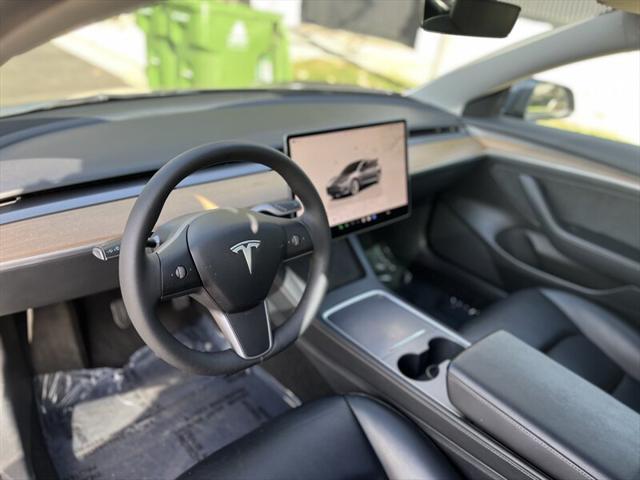 used 2022 Tesla Model 3 car, priced at $15,995