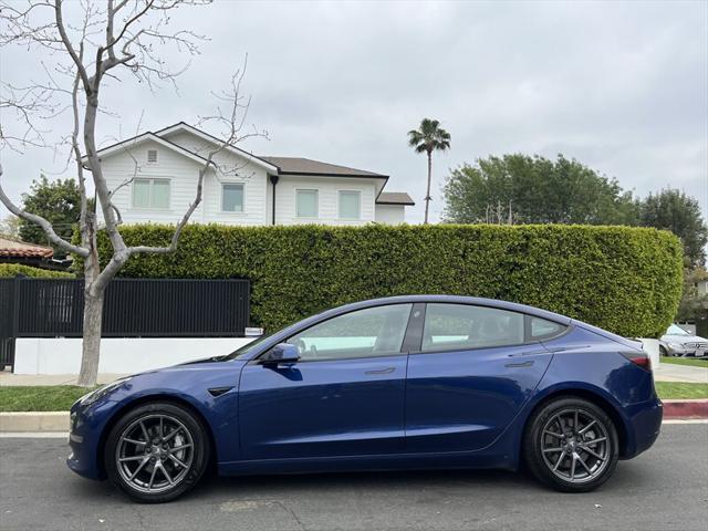 used 2022 Tesla Model 3 car, priced at $14,995