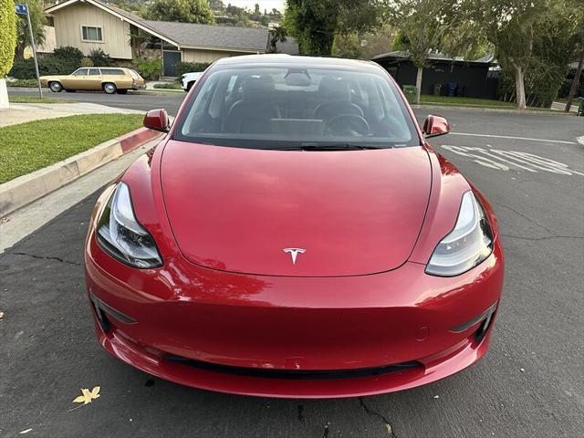 used 2022 Tesla Model 3 car, priced at $15,995