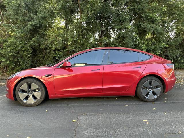 used 2022 Tesla Model 3 car, priced at $14,995