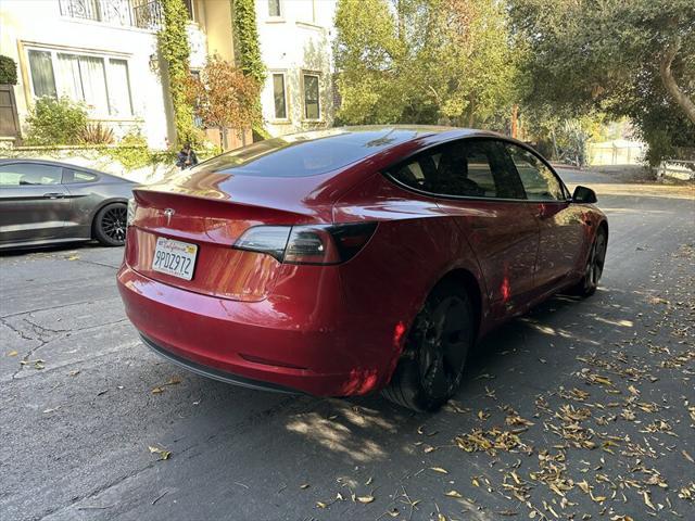 used 2022 Tesla Model 3 car, priced at $14,995