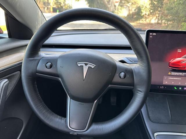 used 2022 Tesla Model 3 car, priced at $14,995