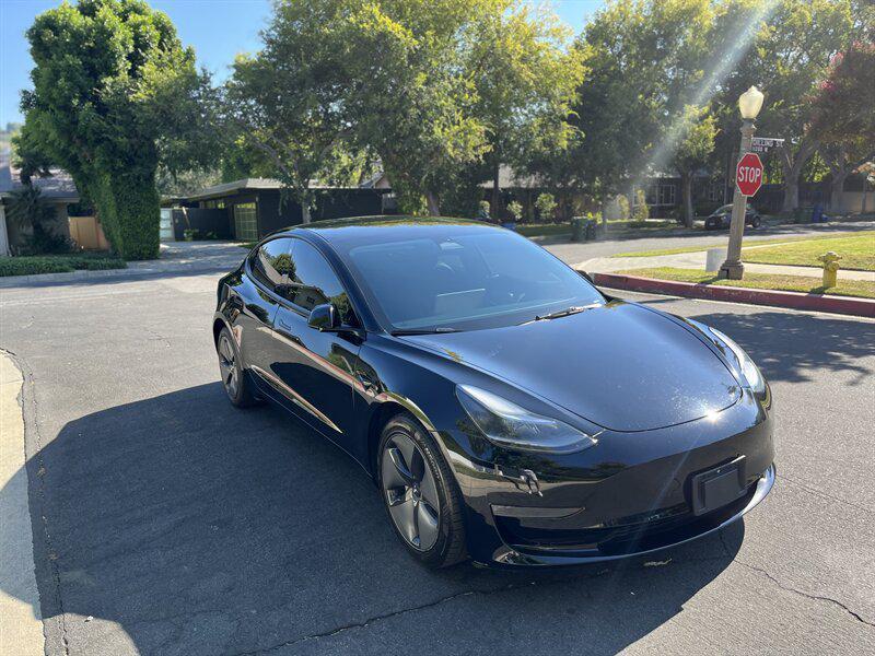 used 2023 Tesla Model 3 car, priced at $19,995