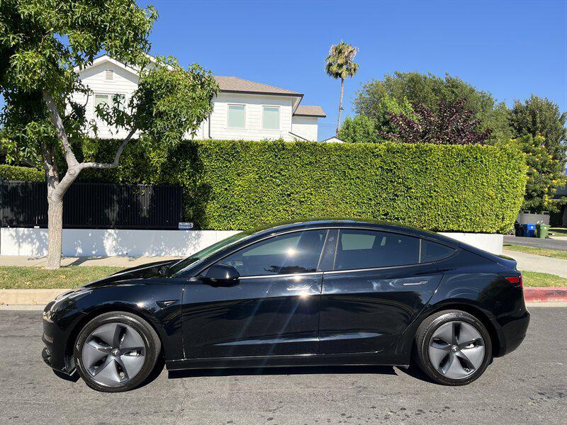 used 2023 Tesla Model 3 car, priced at $19,995