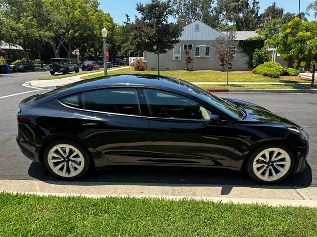 used 2022 Tesla Model 3 car, priced at $15,995