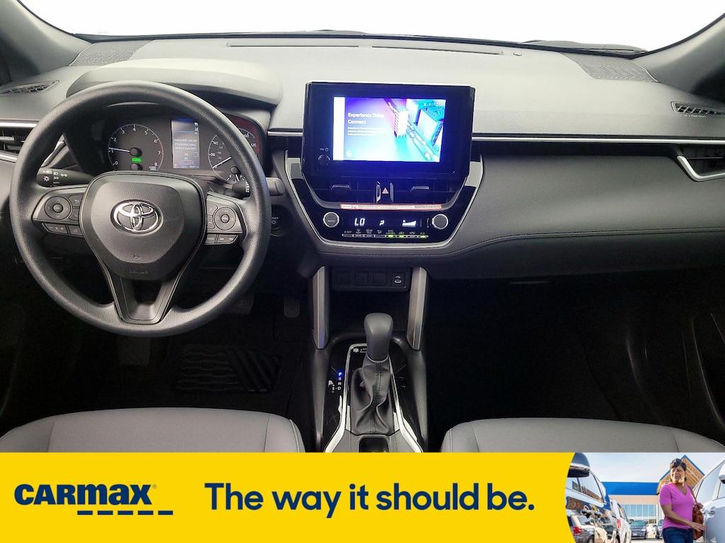used 2025 Toyota Corolla Cross Hybrid car, priced at $31,998