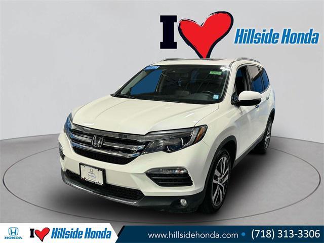 used 2018 Honda Pilot car, priced at $27,342