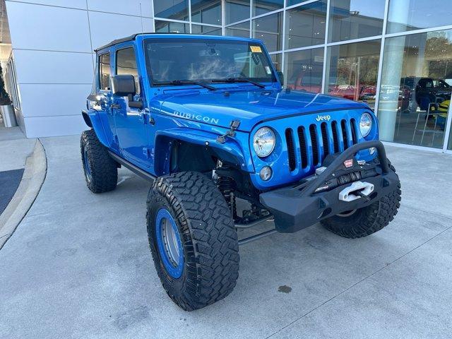 used 2016 Jeep Wrangler Unlimited car, priced at $25,974