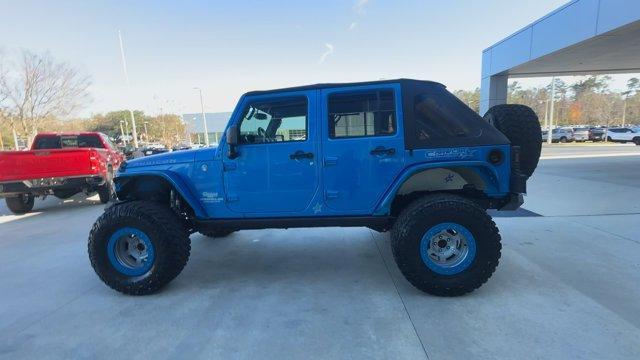 used 2016 Jeep Wrangler Unlimited car, priced at $25,974