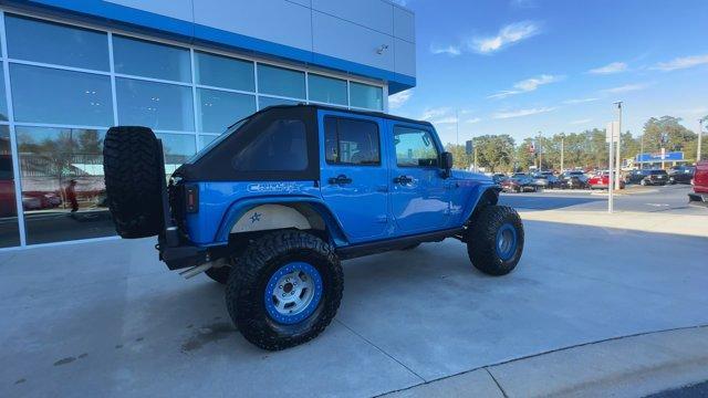 used 2016 Jeep Wrangler Unlimited car, priced at $25,974