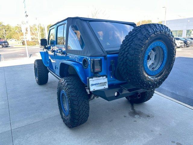 used 2016 Jeep Wrangler Unlimited car, priced at $25,974